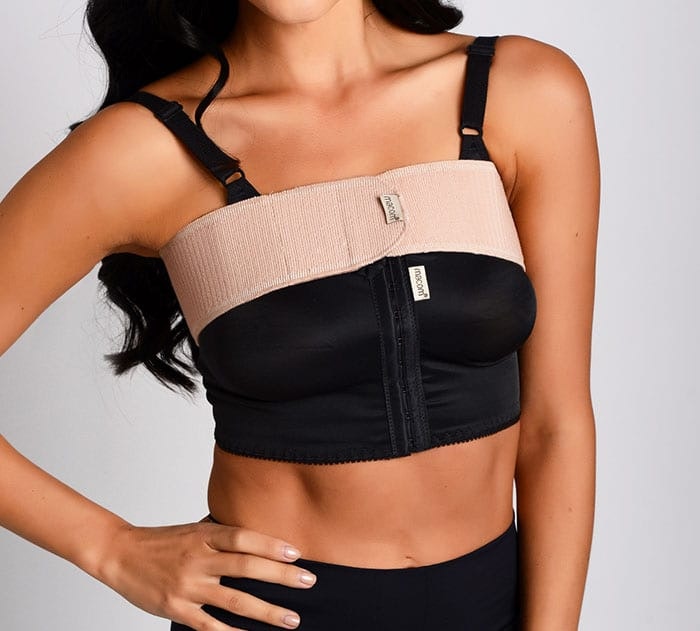 Why do some surgeons use strapping or a breast band MYA